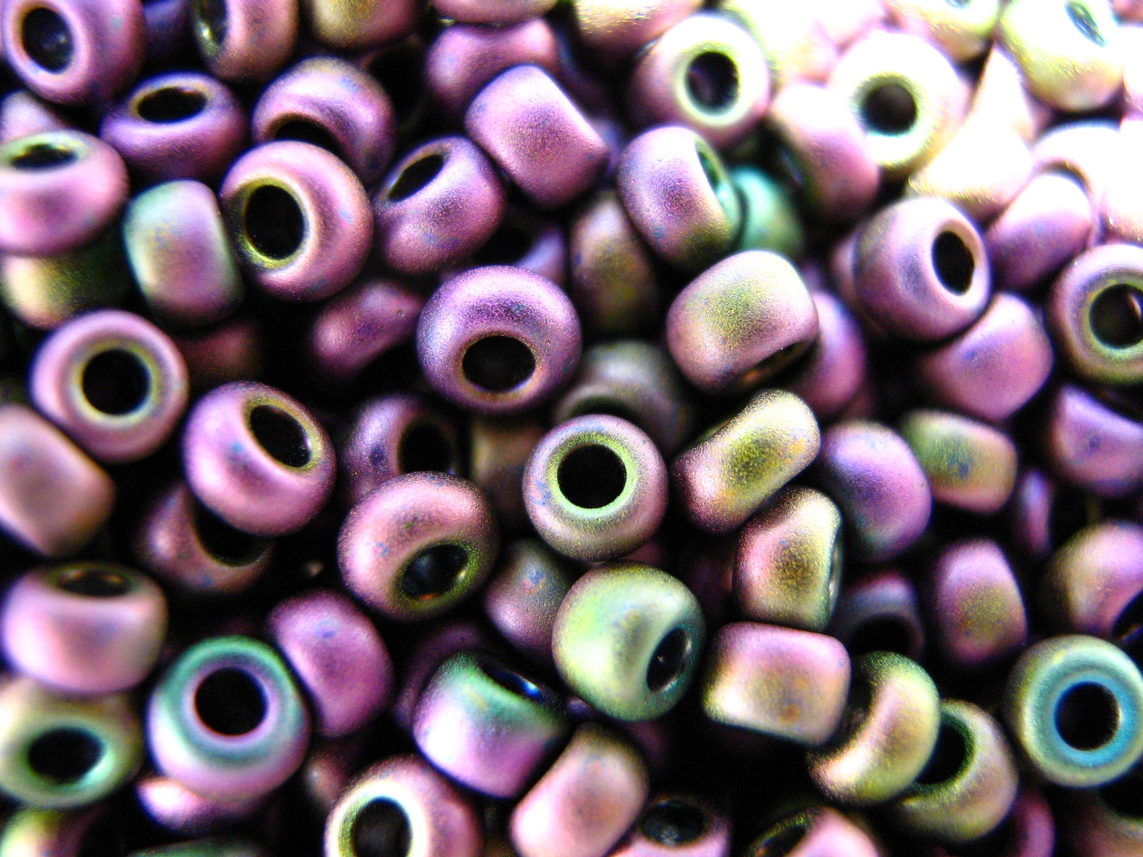 11/0 Round Toho Seed Beads, 16gms. Plumish/Metallic Matte.