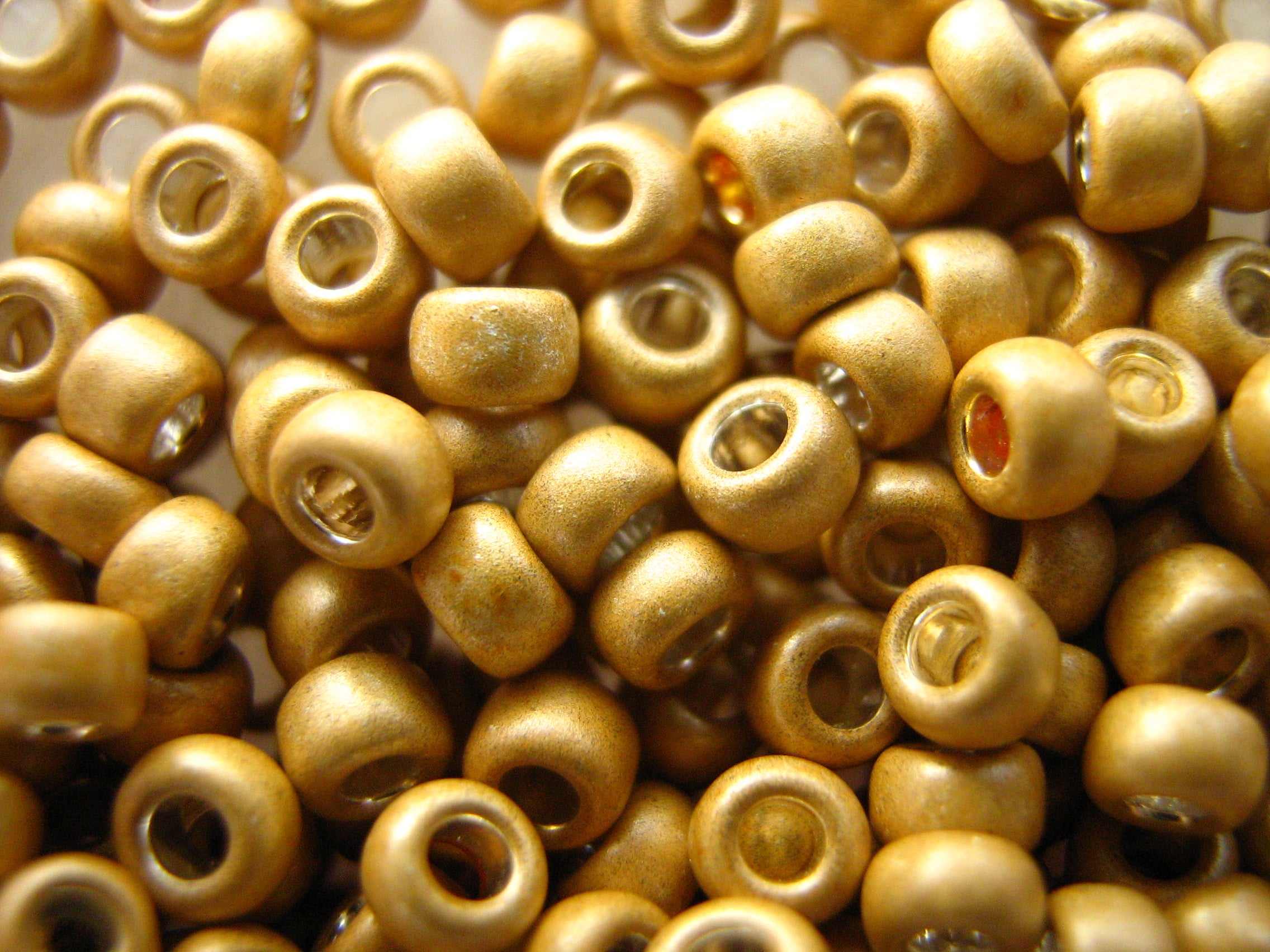 11/0 round Toho Seed Beads 27 gms Matte Metallic Pear.