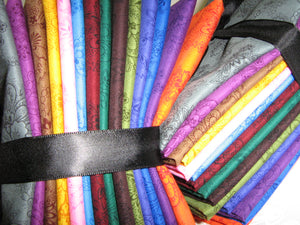 Anastasia Collection Half Yard bundles of assorted colors.